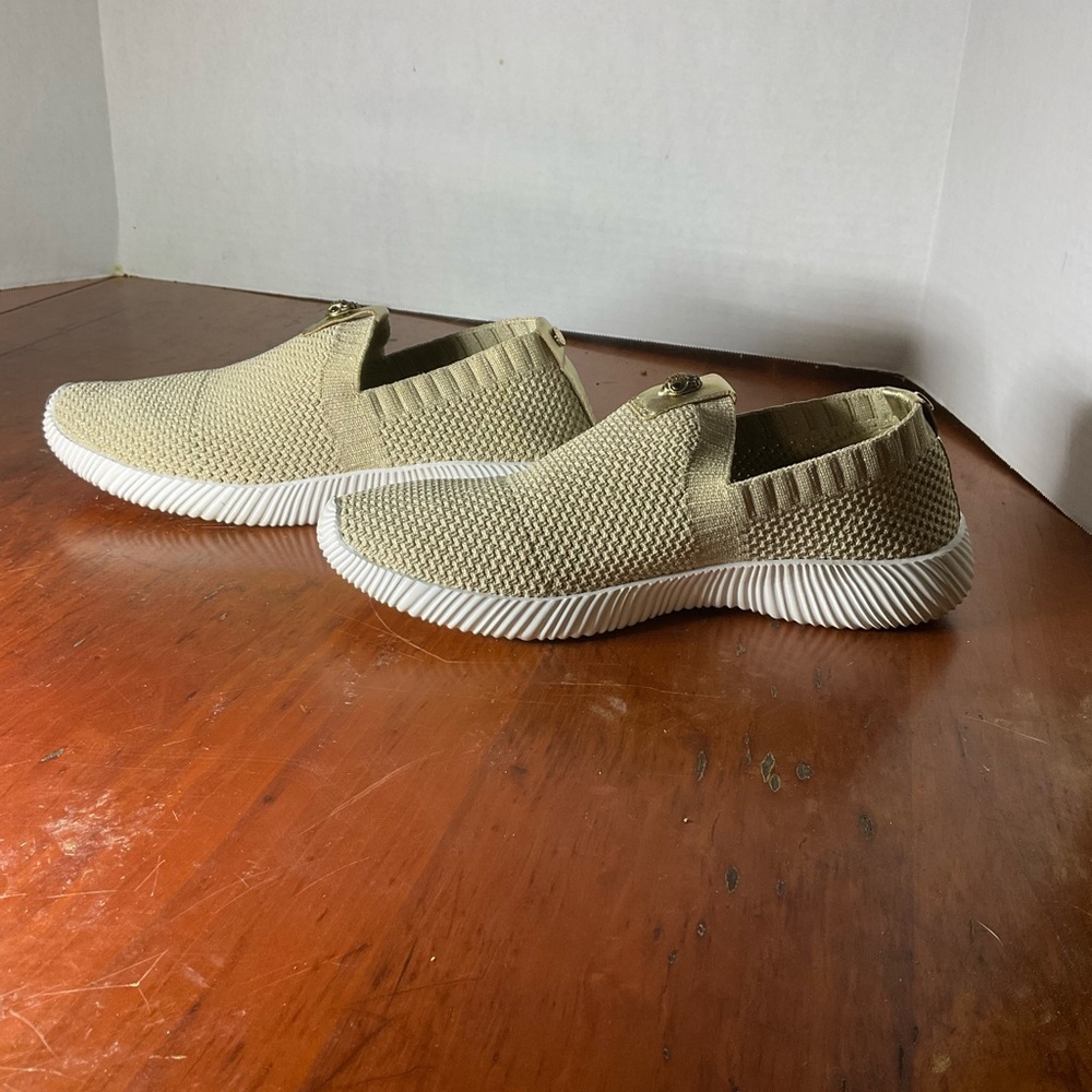 Kurt Geiger women’s gold slip-on sneakers. Size 38.5